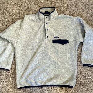 Patagonia men’s XL fleece. Oatmeal/gray with blue trim.